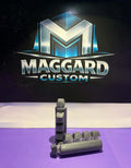 3D printed 5-key mechanical clicker fidget toy in gray with keycap-style buttons on a compact base displayed in front of Maggard Custom logo