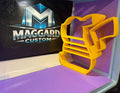 3D printed yellow electric mouse character silhouette open-frame display shelf with pointed ears and built-in ledges displayed in front of Maggard Custom logo